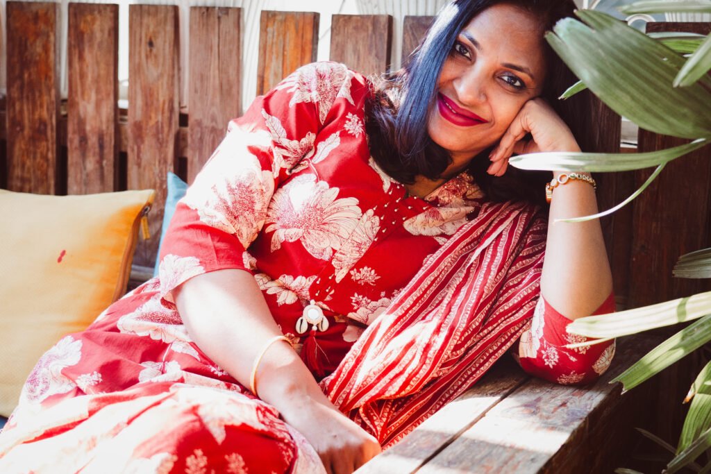 relaxed smiling sitting pose in ethnic suit with dupatta